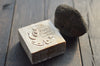 white marble brush vessel